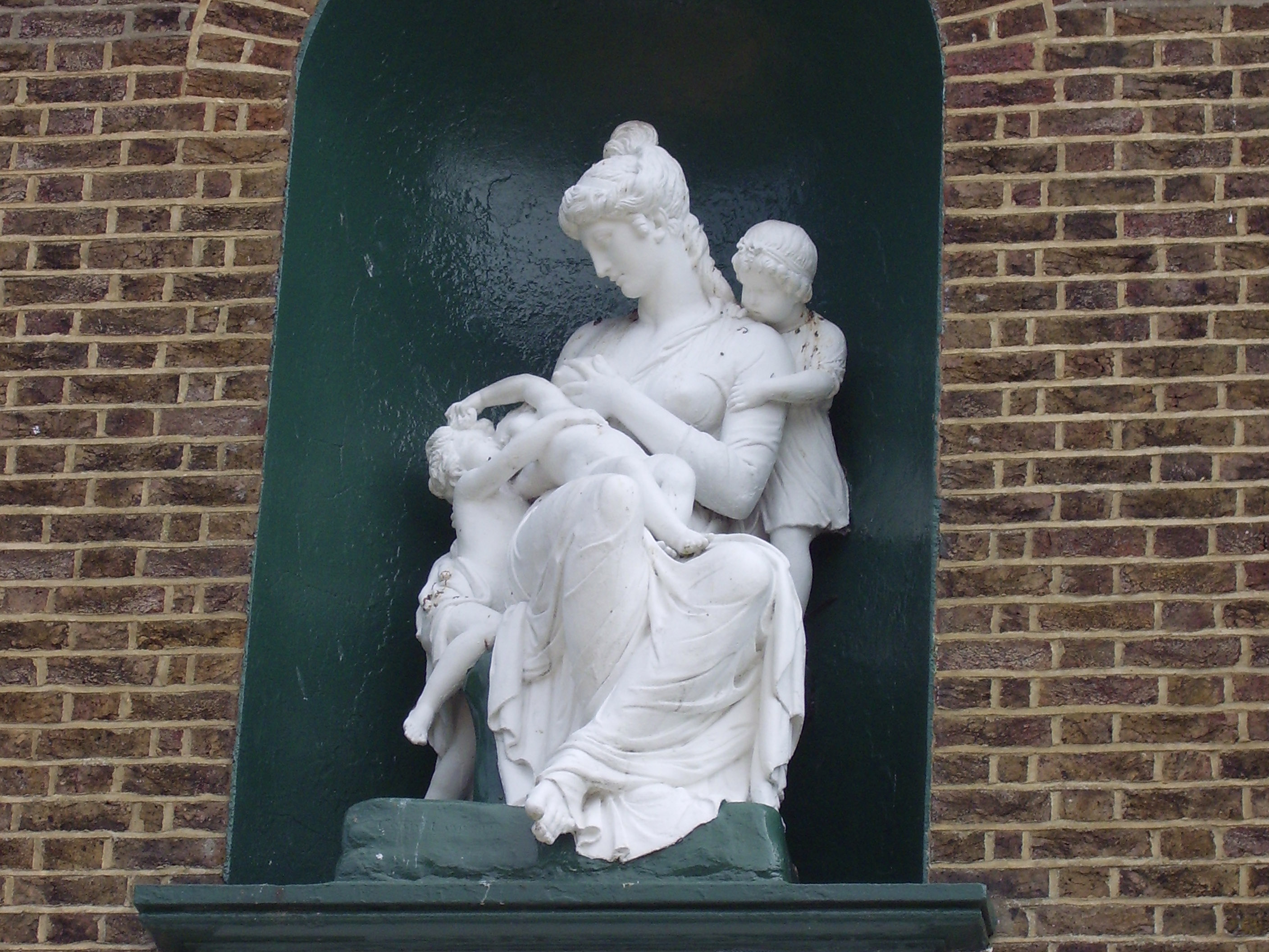statue of a mother and her children